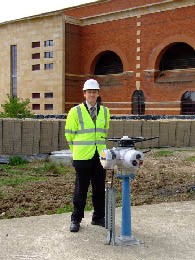 Andrew Bowkett with a Rotork IQ Actuator outside the GAC and ozone treatment building at Mythe. The pedestal mounting saved this actuator from a ducking!